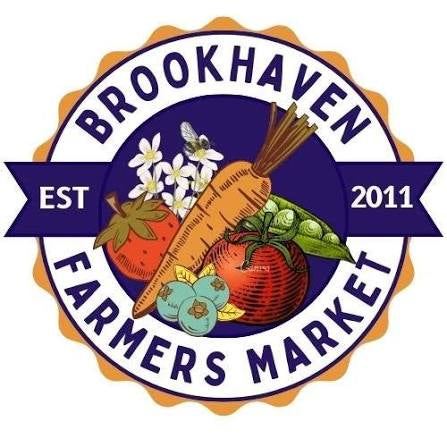 A circular logo for Brookhaven Farmers Market featuring illustrated produce and flowers, with the text 'BROOKHAVEN FARMERS MARKET' and 'EST 2011' on a white background.