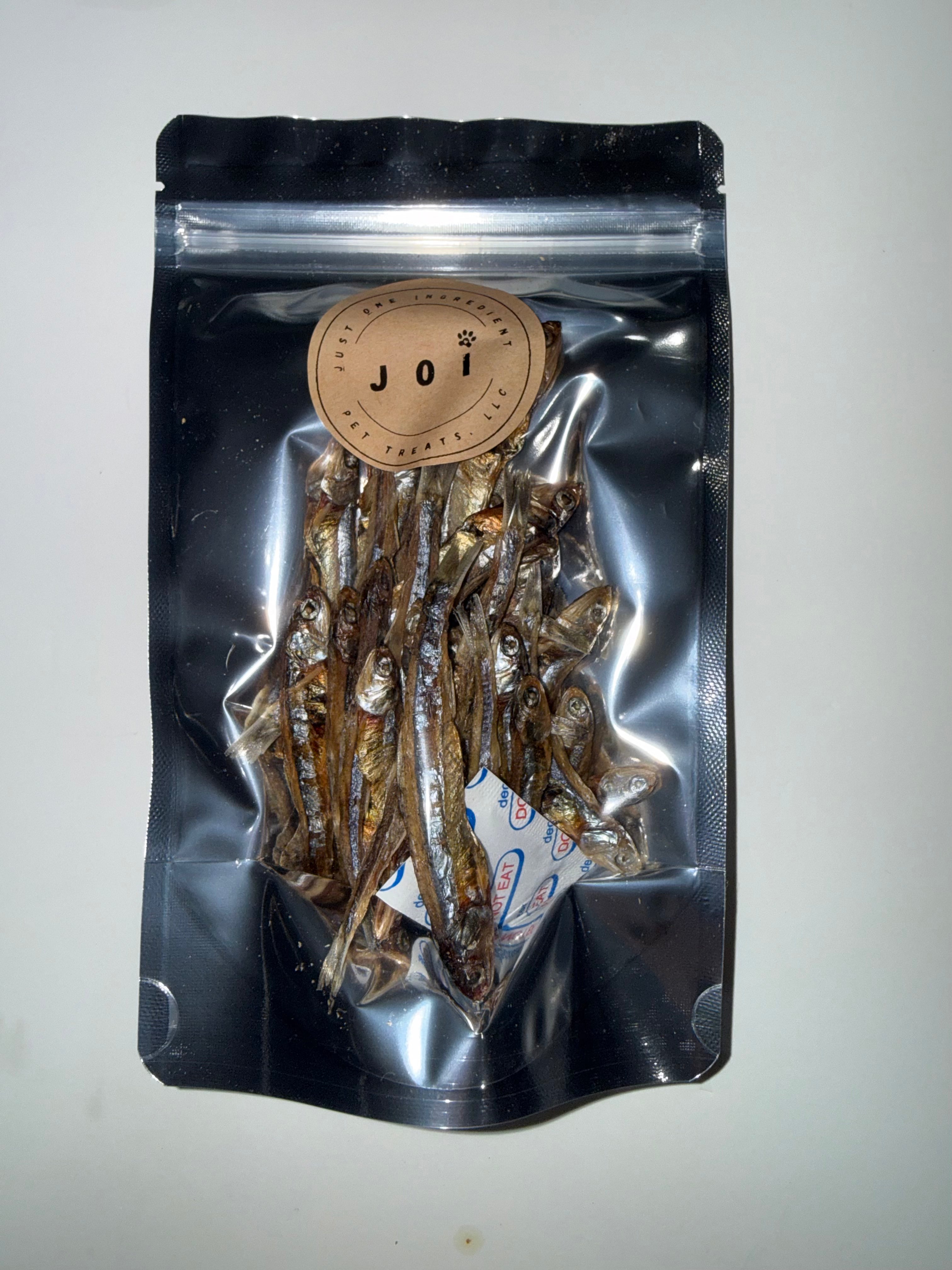 Packaged anchovies treats with JOI label on a white background
