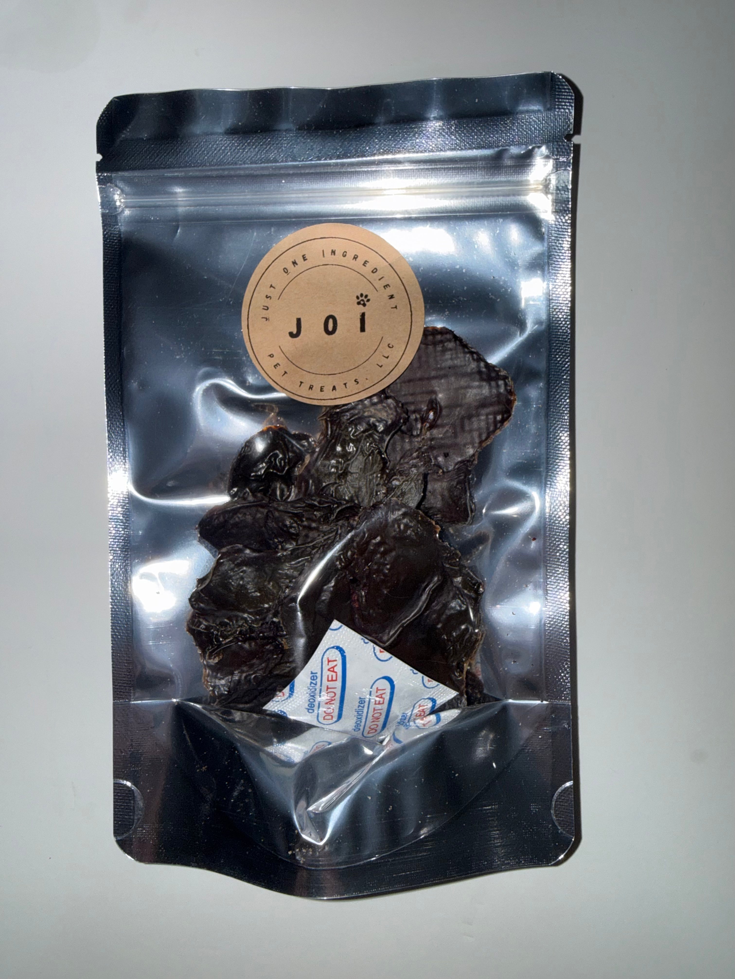 Packaged chicken liver treats with JOI label on a white background