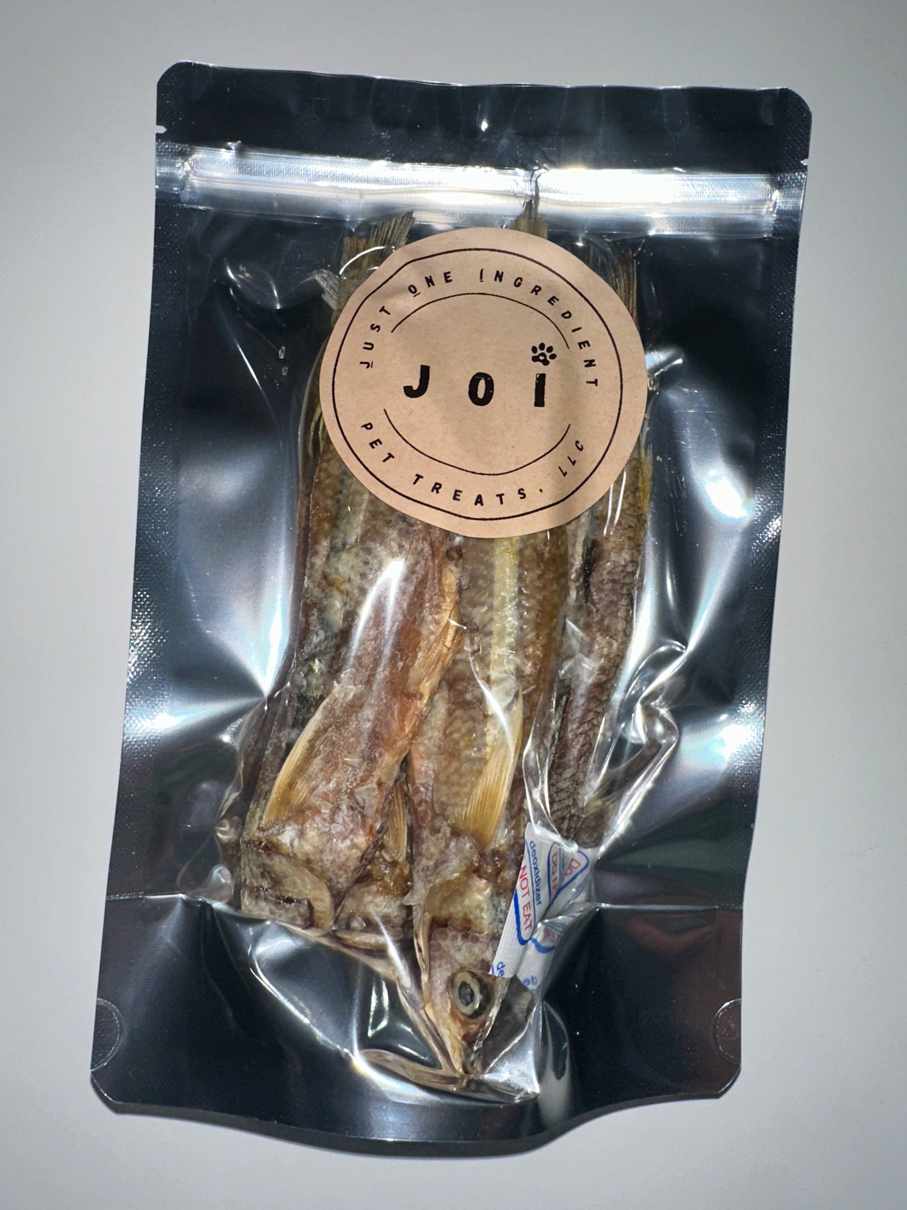 Packaged large smelt treats with JOI label on a white background