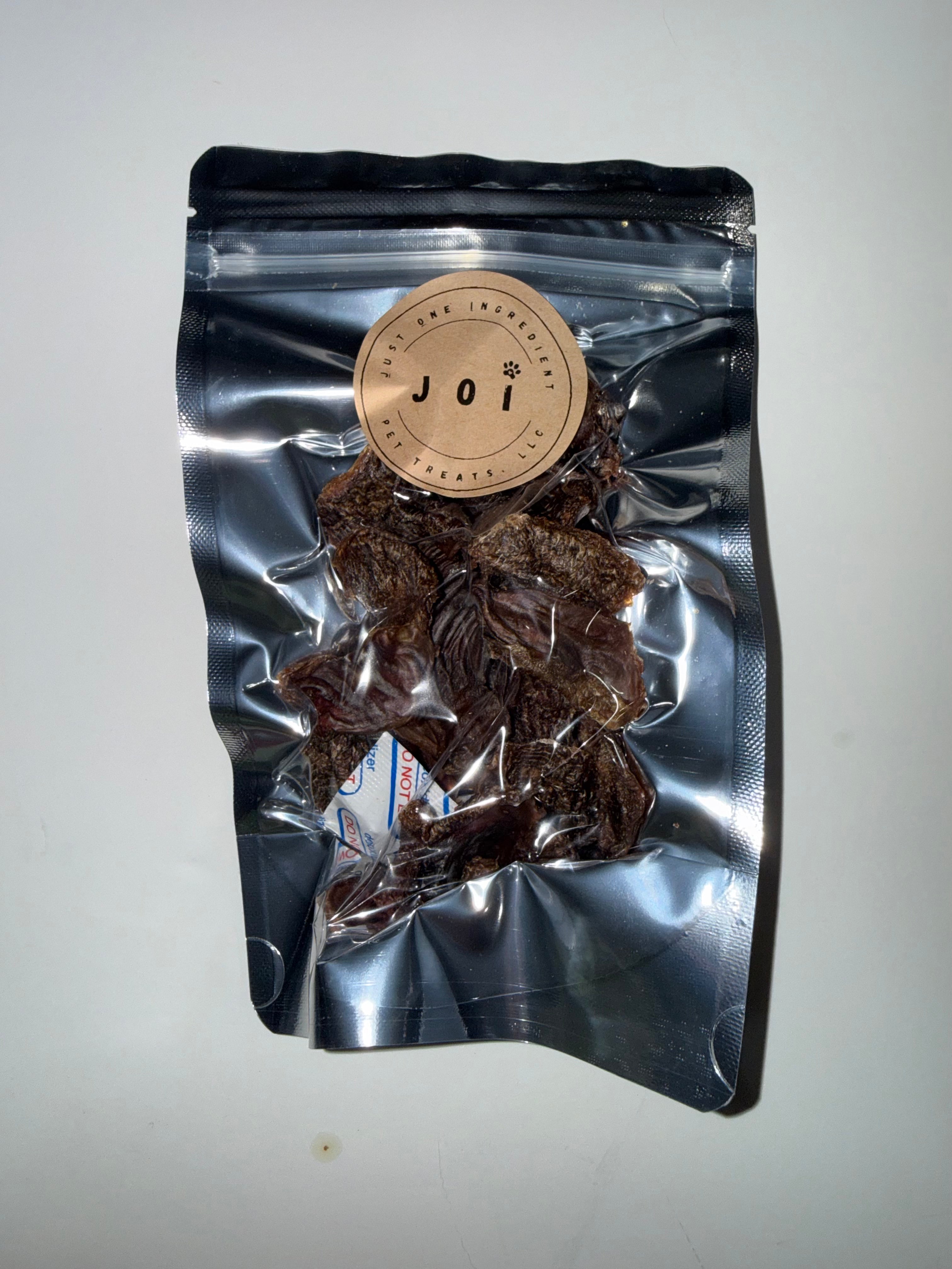 Packaged turkey gizzards treats with JOI label on a white background
