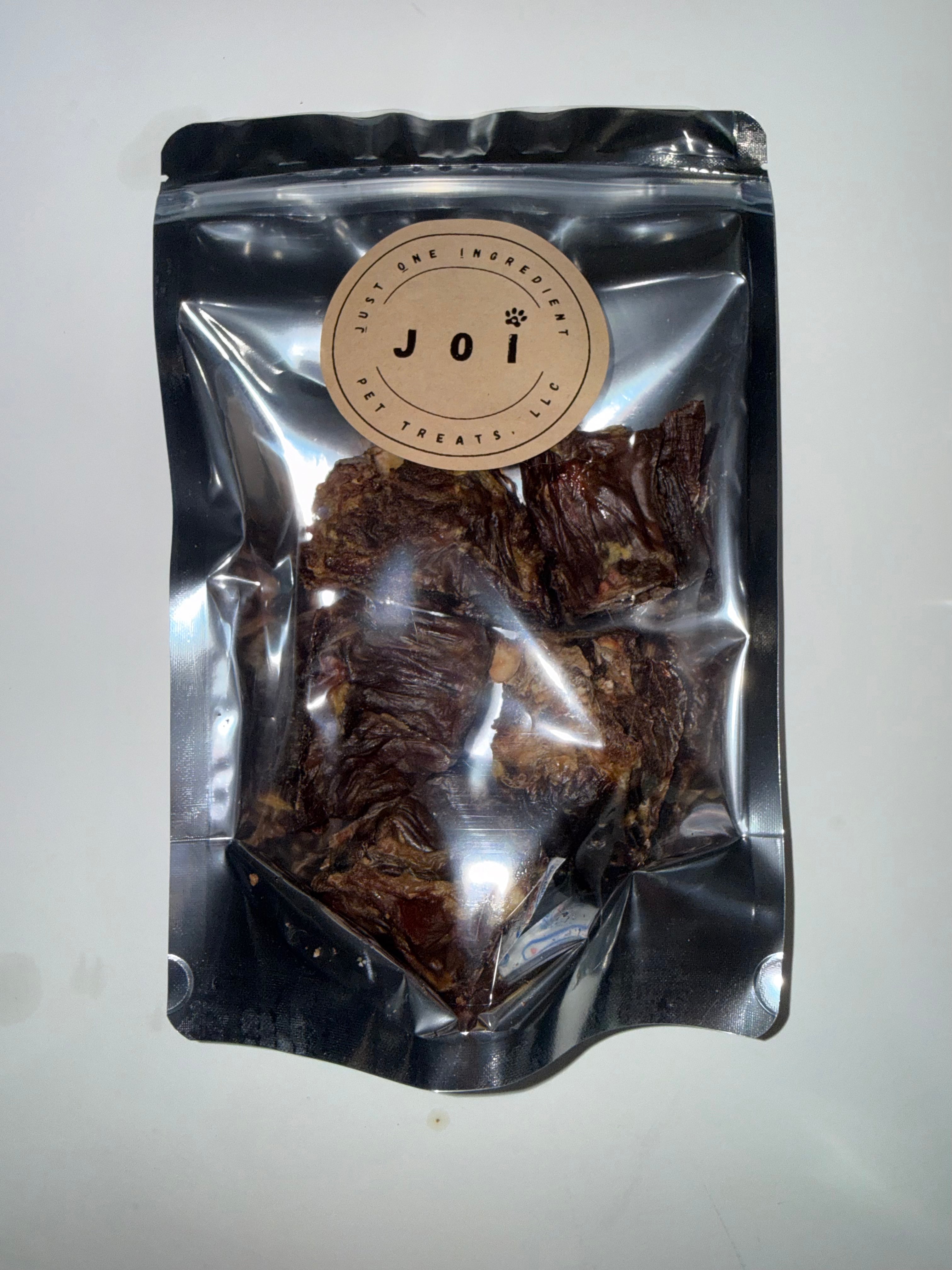 Packaged turkey neck bites treats with JOI label on a white background