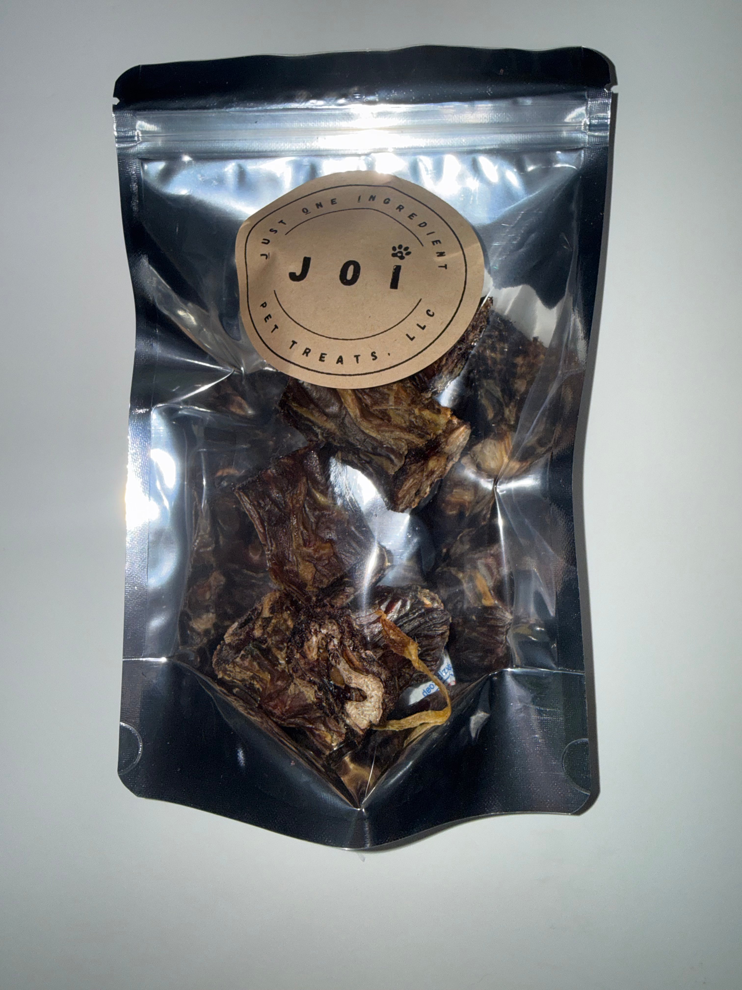 Packaged turkey neck bites treats with JOI label on a white background