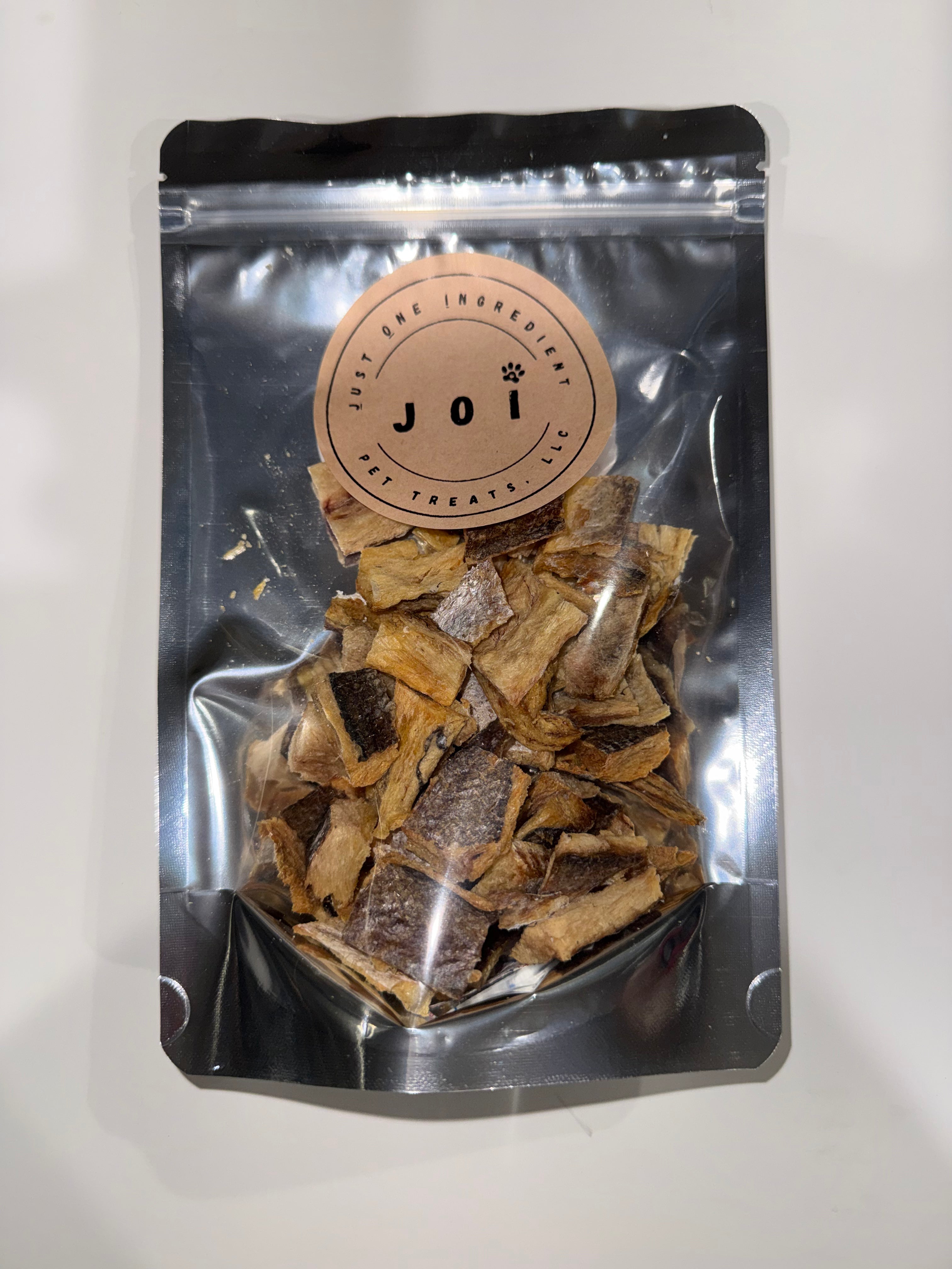Packaged whiting fish chips treats with JOI label on a white background