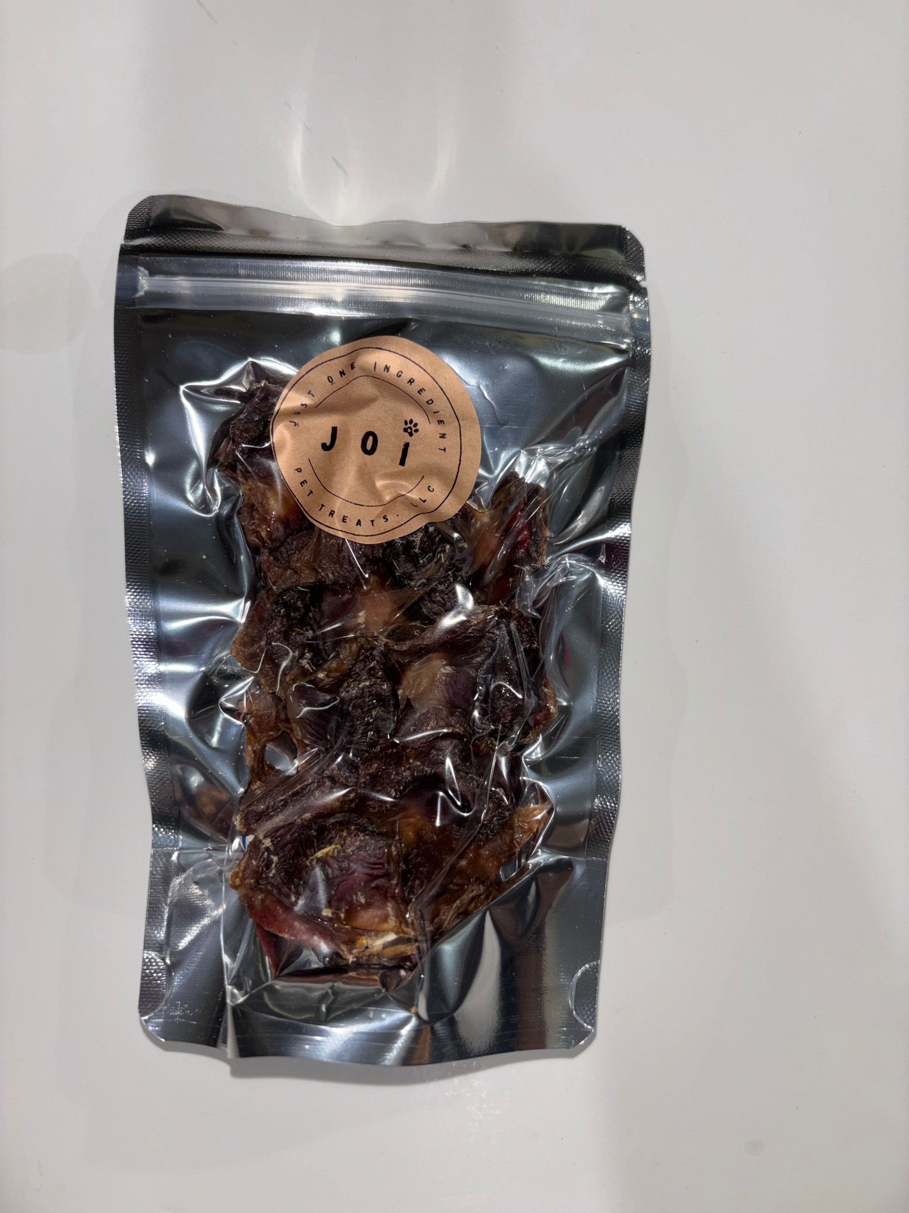 Packaged chicken gizzards treats with JOI label on a white background