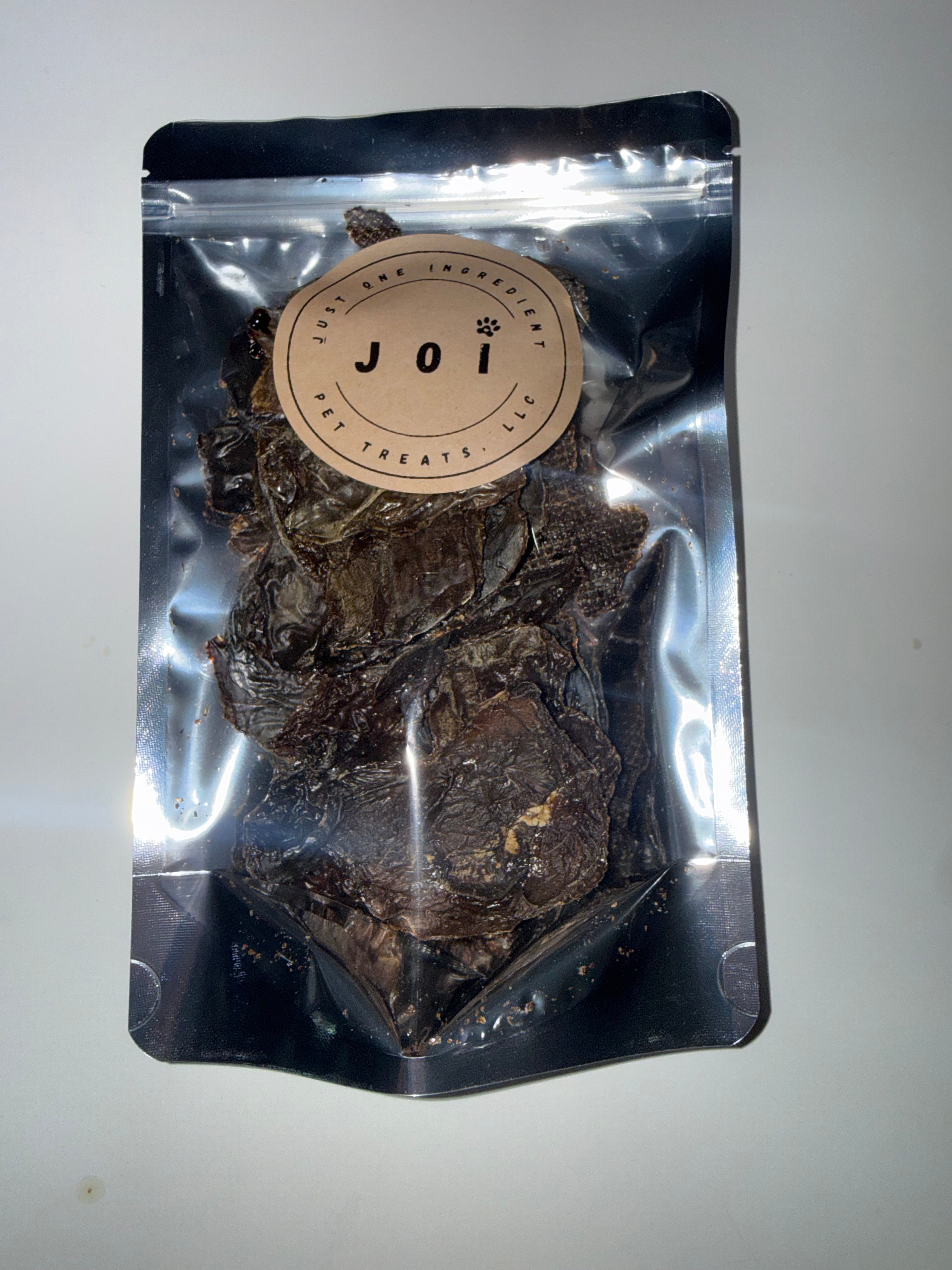 Packaged chicken liver treats with JOI label on a white background
