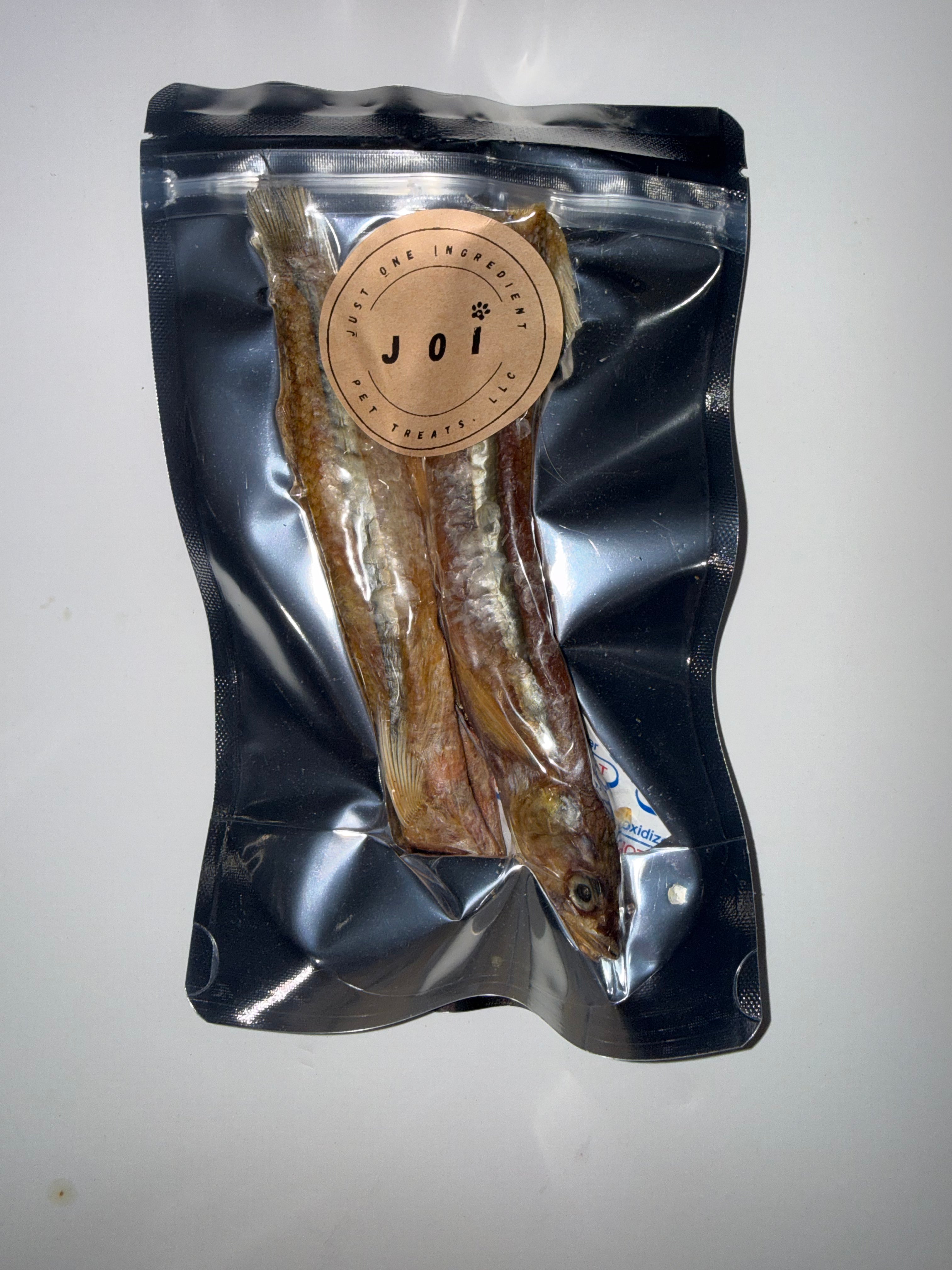 Packaged large smelt treats with JOI label on a white background