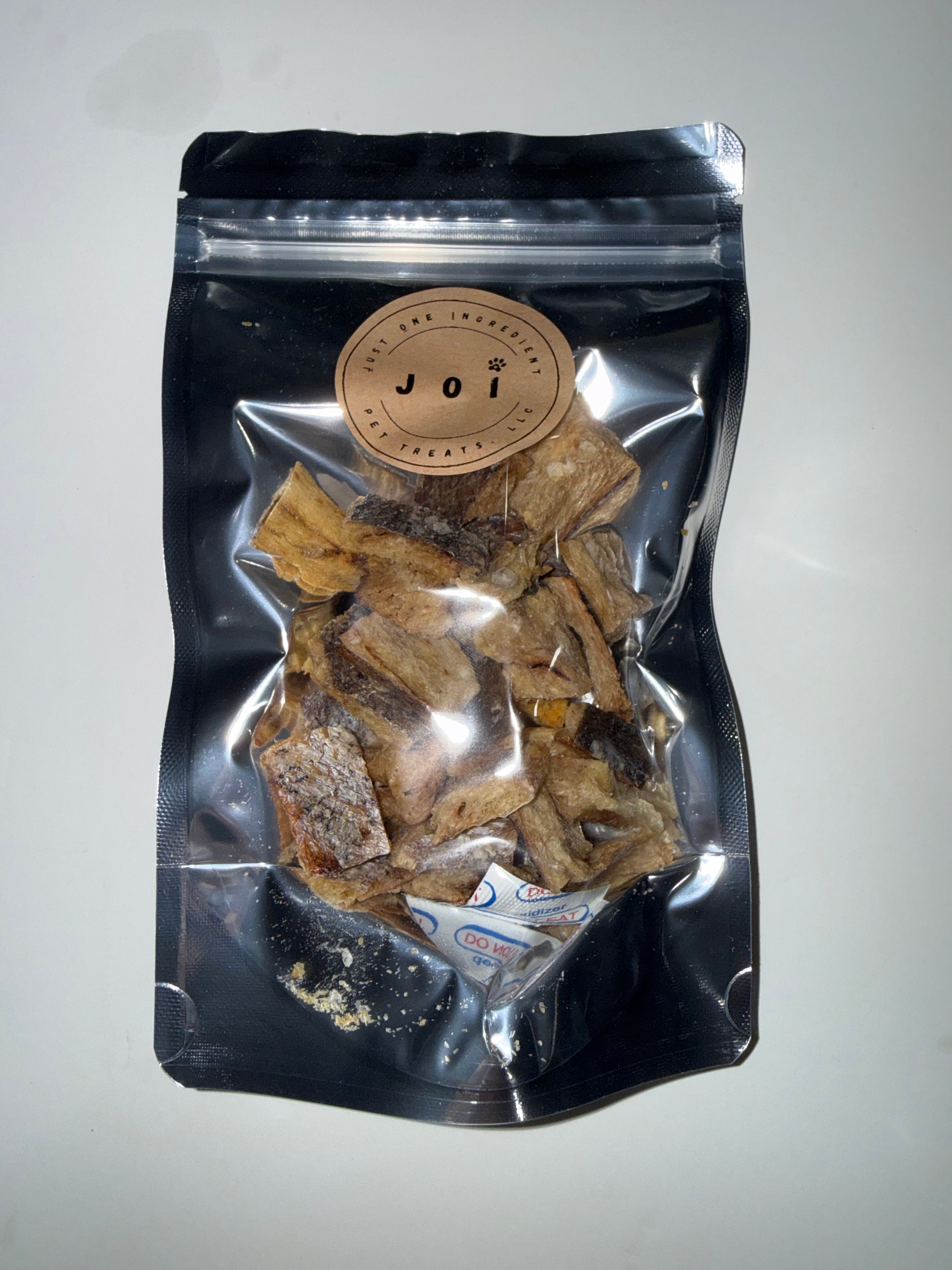 Packaged whiting fish chips treats with JOI label on a white background